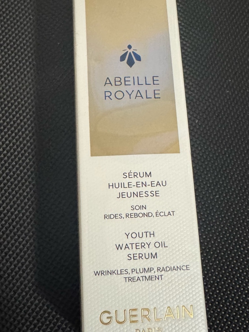 GUERLAIN Abeille Royale Serum Bottle in Gold and White
